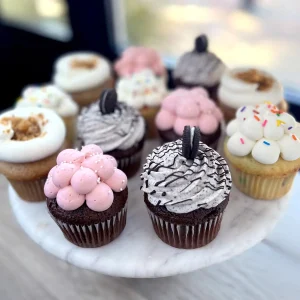 Assorted cupcakes on marble pedestal