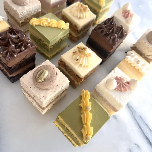 Trafiq Minis, bite sized layered cakes in Matcha Mango, Coffee Tres Leches, Carrot Cake, Lemon and Chocolate