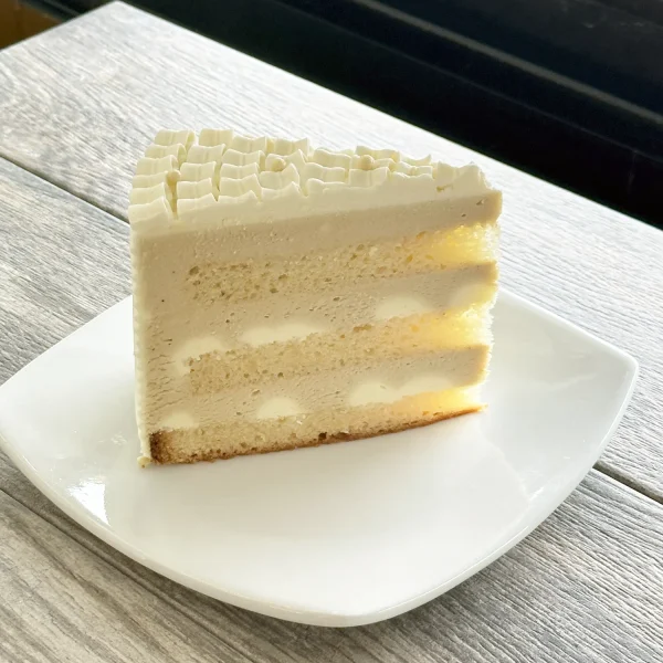 Hojicha Yuzu cake slice with hojicha mousse, yuzu namelaka, and white chocolate ganache, Trafiq Bakery Vancouver