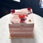 Trafiq's Strawberry Bliss cake for Mother's Day, with flower petals and heart