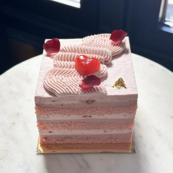 Trafiq's Strawberry Bliss cake for Mother's Day, with flower petals and heart